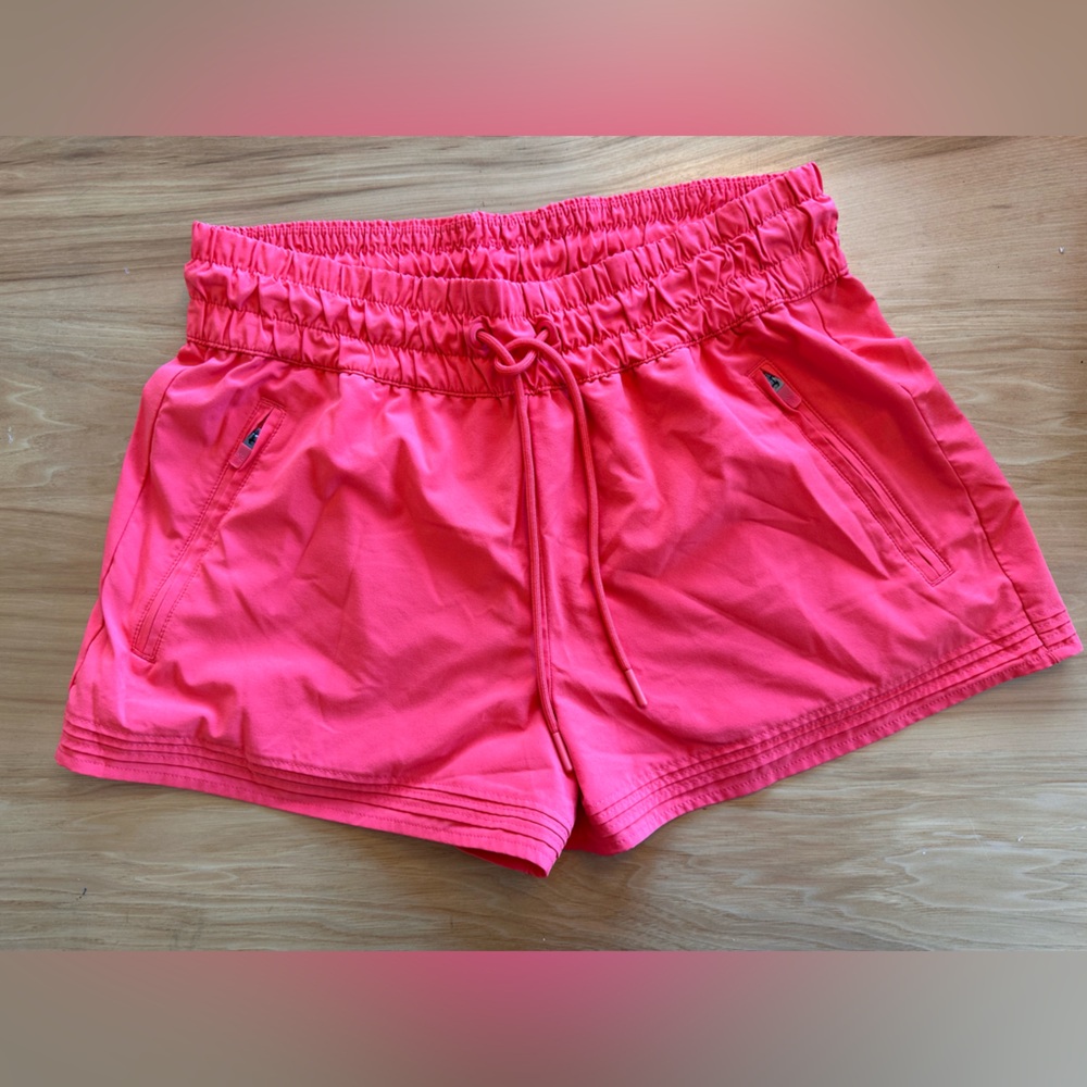 Athleta Women’s Orange Shorts with Pockets Medium